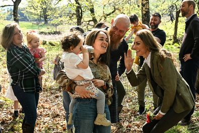 ARDURA, SCOTLAND - APRIL 30: Catherine, Princess of Wales (R) jokes with children from Ardura Acorns group and their family during a visit to Ardura Community Forest on April 30, 2025 in Ardura, Isle of Mull, Scotland. The Prince and Princess of Wales are on a two-day visit to the Isles of Mull and Iona on the 29th and 30th of April to engage with rural island communities. During their time on the islands, they will connect with local residents, highlighting the value of social bonds and undersc
