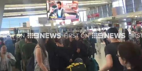 Technical issue with check-in causing delays at Sydney Airport