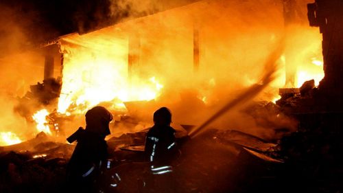 Syria White Helmet firefighters at the scene of the explosion in the country's north. 