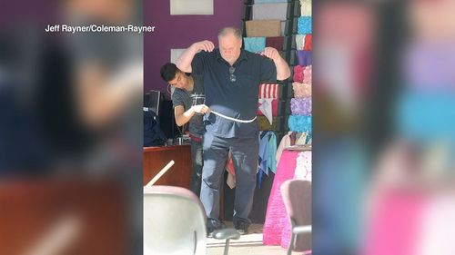Thomas Markle tries on a wedding suit in a picture taken by the agency blamed for the staged paparazzi shots.