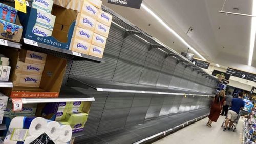 An empty aisle in the St Ives, Woolworths store, where the toilet paper should be.