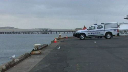 Police at the scene in Brennan's Wharf in Port Lincoln. (9NEWS)