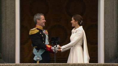 King Frederik and Queen Mary appear on the balcony during proclamation 