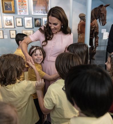 Catherine, Princess of Wales, Patron of the V&A, speaks with children of Globe Primary school in Bethnal Green as she officially opens The Young V&A, (formerly known as the V&A Museum of Childhood) on June 28, 2023 in London 