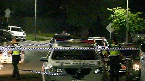 Forensics officers are searching for evidence at the address in Hallam. (9NEWS)