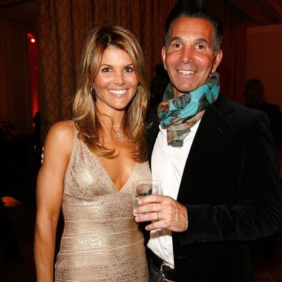 BEVERLY HILLS, CA - FEBRUARY 20:  Actress Lori Loughlin (L) and husband Mossimo Giannulli attend the Saks Fifth Avenue's Unforgettable Evening cocktail reception benefiting Entertainment Industry Foundation's (EIF) Women's Cancer Research Fund held at the Beverly Wishire Hotel on February 20, 2008 in Beverly Hills, California.  (Photo by Donato Sardella/WireImage)