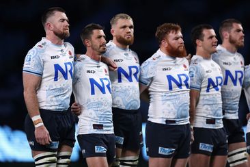Jed Holloway of the NSW Waratahs and teammates line up.