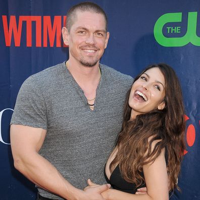 Sarah Shahi and Steve Howey arrives at the CBS, CW And Showtime 2015 Summer TCA Party at Pacific Design Center on August 10, 2015 in West Hollywood, California.