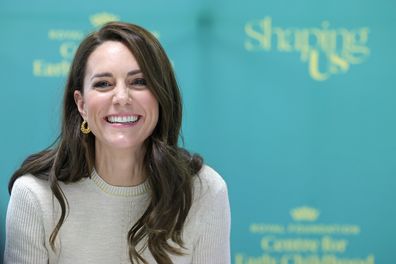 Catherine, Princess of Wales laughs with students on the Childhood Studies BA at the University of Leeds on January 31, 2023 in Leeds, England. 