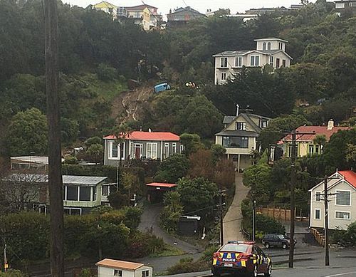 The landslide at a suburban street in Dunedin. About 12 properties were evacuated on Saturday. (Photo: Keith Kelsall).