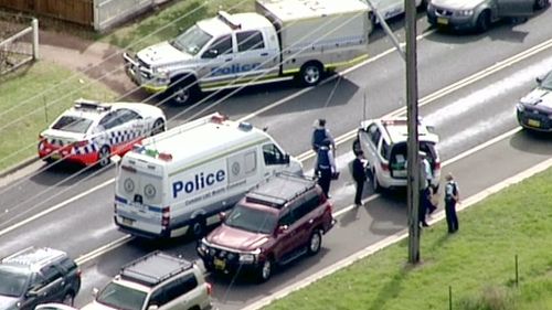 Menangle Road and Woodbridge Road were cordoned off by police. (9NEWS)