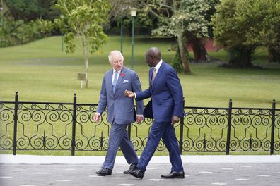 Kenya's President William Ruto and Britain's King Charles III, left, walk at State House, in Nairobi, Kenya Tuesday, October 31, 2023. 