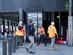 Workers outside the Reserve Bank of Australia.