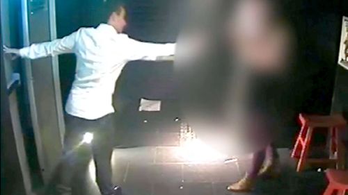 CCTV footage shows Luke Lazarus leading Mullins outside the nightclub. (9NEWS)