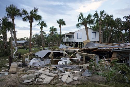 The remains of a destroyed building are seen in Horseshoe Beach, Fla., after the passage of Hurricane Idalia, Wednesday, Aug. 30, 2023.  