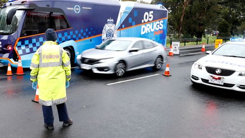 Victoria Police set up a check point in Melbourne, Australia.  Lockdowns across Melbourne are in effect for residents of suburbs identified as COVID-19 hotspots following a spike in new coronavirus cases through community transmission.