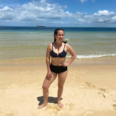 Sian Holderness poses in her bikini at the beach.