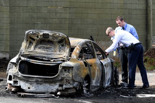A burnt out car was found one kilometre from the shooting scene. (AAP)