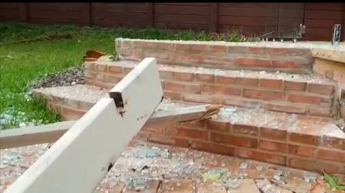 Smashed glass during wild Sydney weather.