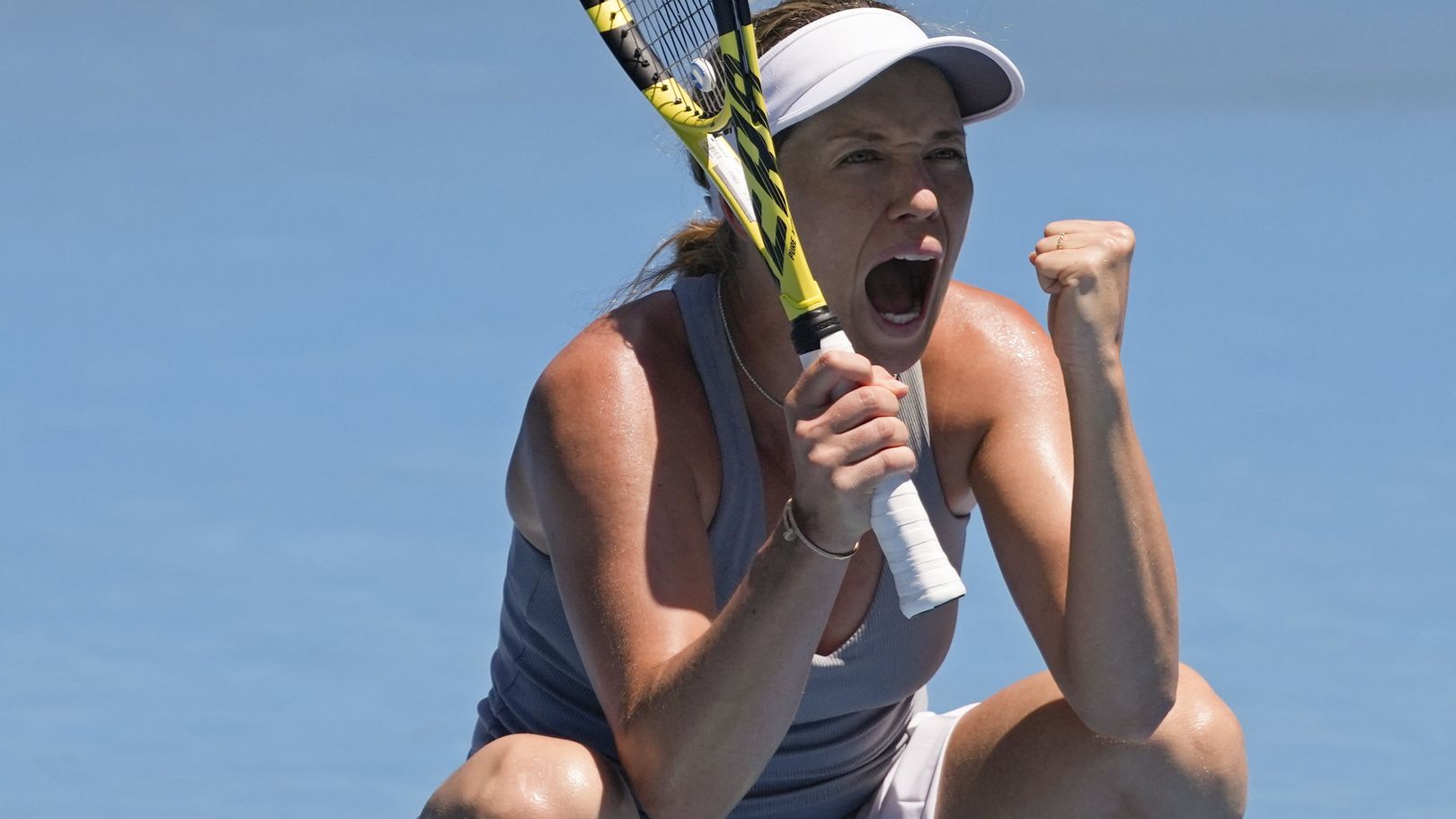 Danielle Collins of the U.S. reacts after defeating Alize Cornet of France in their quarterfinal match at the Australian Open.