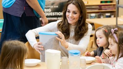 The Duchess of Cambridge Kate Middleton and Mrs Giovanna Fletcher served breakfast to the children at the Stockwell Gardens Nursery