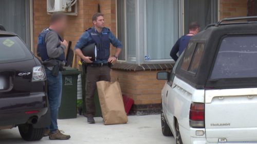 Officers were snapped taking evidence from the scene. (Victoria Police)