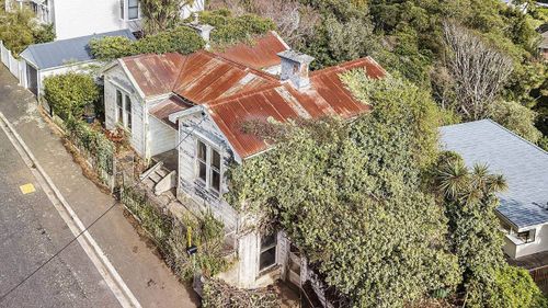 The derelict house at 78 Creswick Terrace, Northland, Wellington, New Zealand.