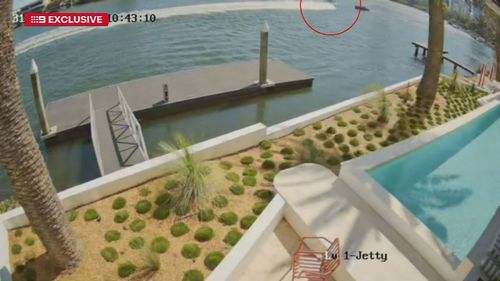 Vision has captured the moment a boat ended up on top of another during a horror crash in the Queensland River.