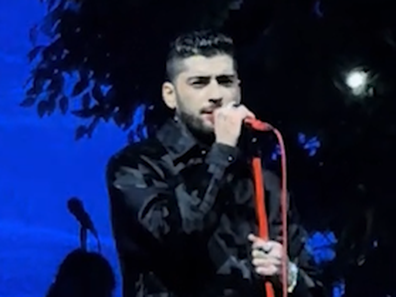 Zayn Malik reveals Louis Tomlinson is at his show