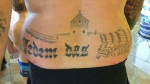 Suspended sentence for German MP sporting Nazi tattoo