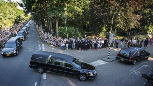 Each of the bodies was assigned its own hearse for the drive through the city. (Getty Images)