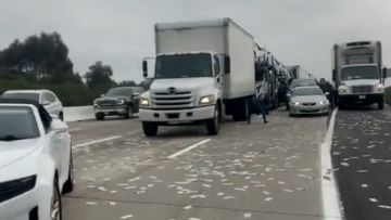 Money flew out of a truck carrying over a million dollars in California. 