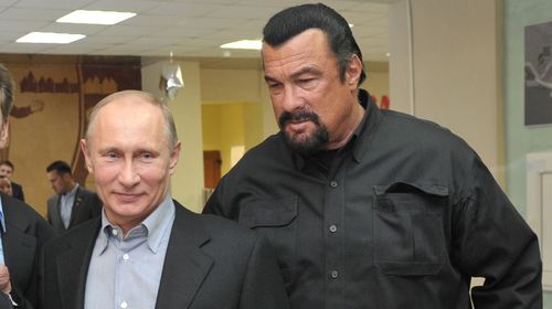 Putin meets US film star Steven Seagal on a visit to a sports complex in Moscow. (Getty)