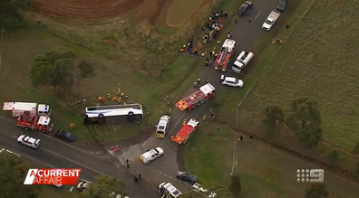 A school bus and a truck collided in a small town west of Melbourne, causing the bus to roll.