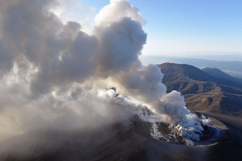 A column of volcanic smoke rises from the crater on the Shinmoedake volcano, (AP)