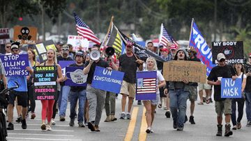 Protesters in Sanford, Florida demonstrating against a rule mandating the wearing of masks. 