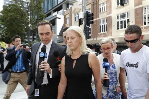 Heidi Strbak (centre) arrives with her lawyer and family members at the Supreme Court in Brisbane last week. (AAP)