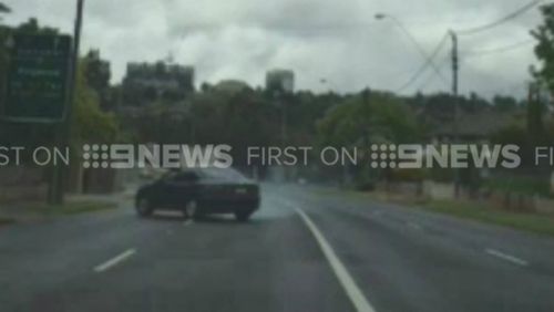 Witnesses said the car skidded for nearly 80 meters before crashing into two properties. (9NEWS)
