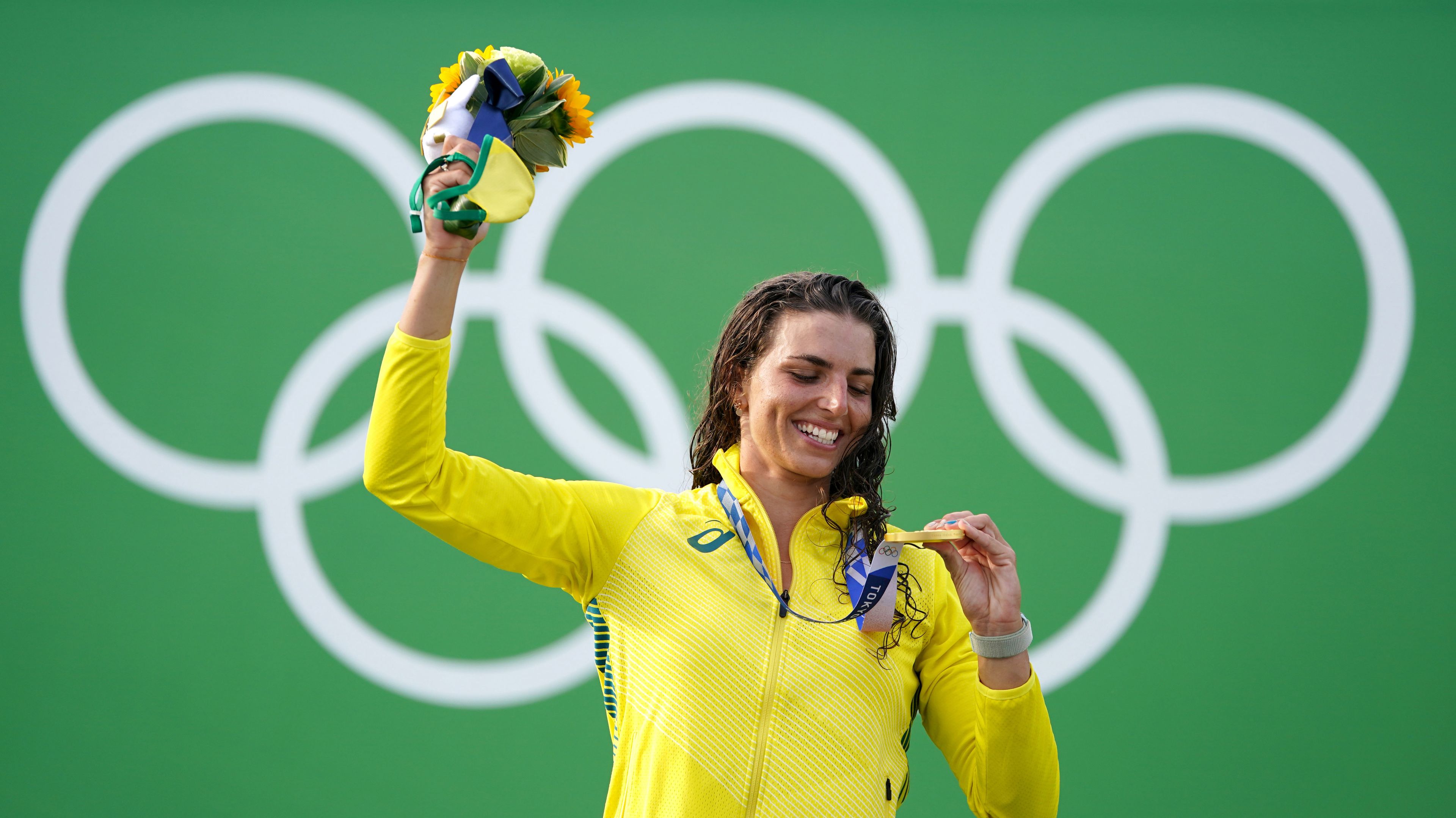 Australia&#x27;s Jessica Fox celebrates with her gold medal after winning the women&#x27;s C1 Canoe Slalom on the sixth day of the Tokyo 2020 Olympic Games in Japan.