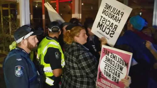 Protesters chanted for Ms Hanson to "get out."" (9NEWS)