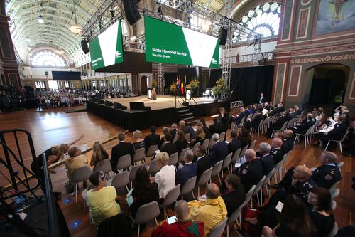 Emergency workers and the public at a public memorial service in the Melbourne Royal Exhibition building to commemorate the first anniversary of the Bourke Street tragedy. (AAP)