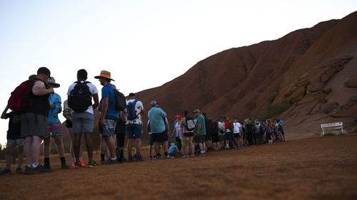 The looming ban has prompted many people to climb Uluru before it is too late.
