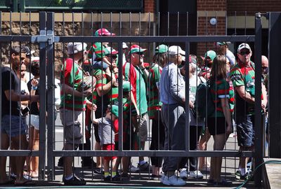 Fans line up outside Redfern Oval awaiting their heroes.