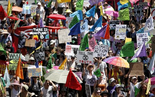 Extinction Rebellion activists march during Brisbane Rebellion Week, Brisbane, Monday, October 7, 2019. 