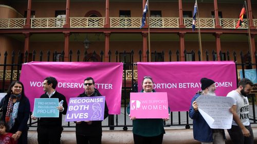 A small group of pro life anti abortion protesters rally outside NSW State Parliament as the Reproductive Health Care Reform Bill 2019 debate continues in the New South Wales. 