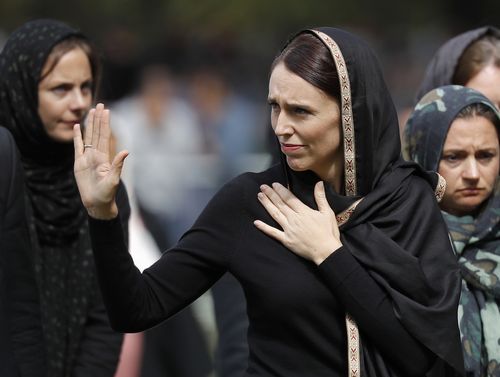 New Zealand Prime Minister Jacinda Ardern waves as she leaves Friday prayers at Hagley Park in Christchurch, New Zealand. Ardern was hailed around the world for her decisive response to the two mosque shootings by a white nationalist who killed 50 worshippers in Christchurch mosques on 15 March 2019. Community leaders and researchers say that for too long, terrorism was considered a "Muslim problem" and that a double standard persists when attacker is white and non-Muslim.