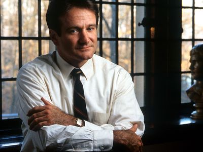 Robin Williams as John Keating