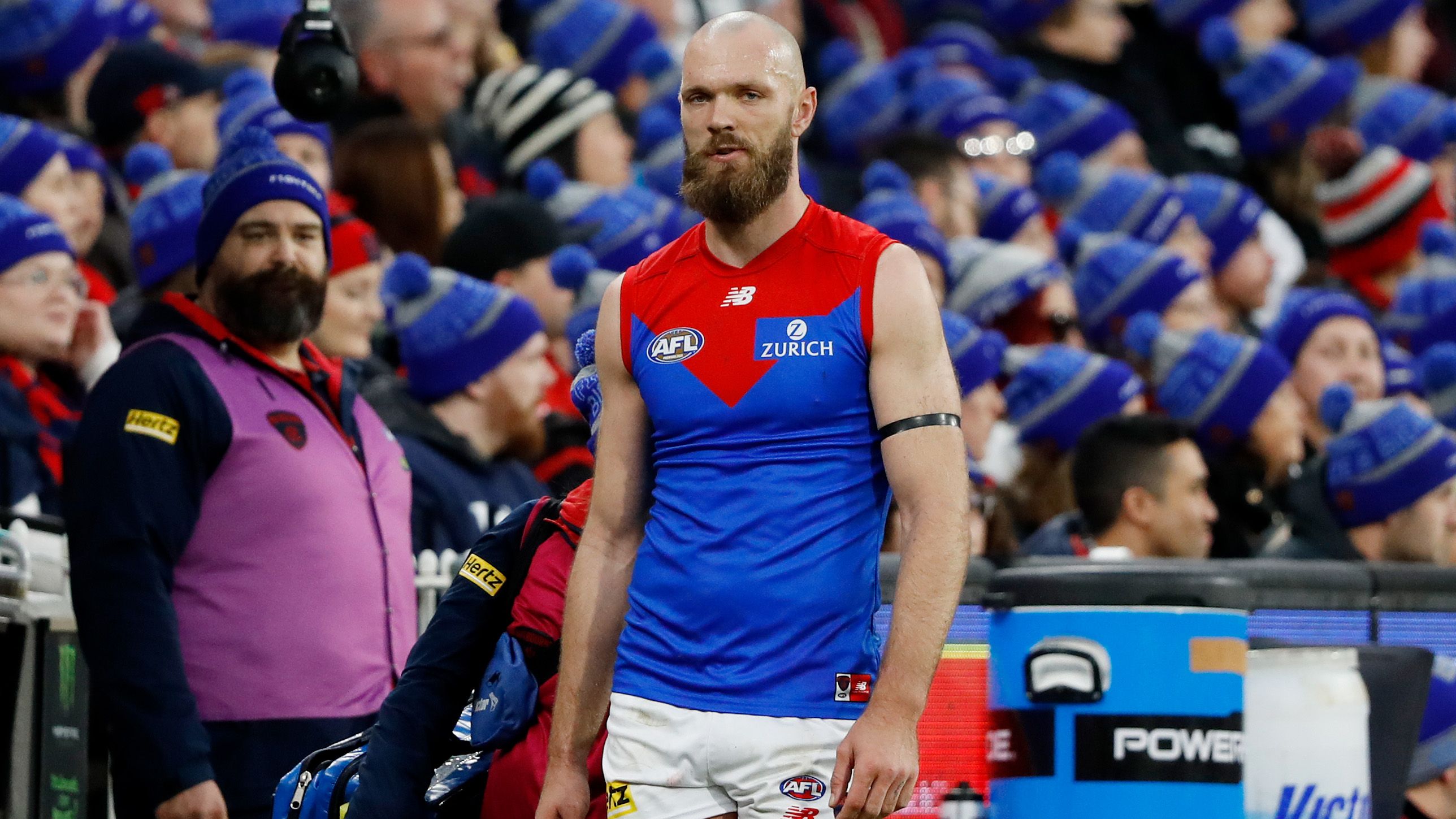 Melbourne&#x27;s Max Gawn comes to the bench injured.