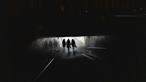 Women walk down to the metro at the city center in Kharkiv, Ukraine.