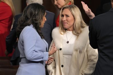 Representative Monica De La Cruz, a Republican from Texas, left, talks with Representative Marjorie Taylor Green, a Republican from Georgia, ahead of a State of the Union address at the US Capitol in Washington, DC, US, on Tuesday, Feb. 7, 2023. President Biden is speaking against the backdrop of renewed tensions with China and a brewing showdown with House Republicans over raising the federal debt ceiling. Photographer: Jacquelyn Martin/AP/Bloomberg